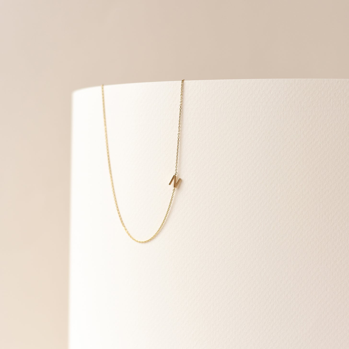 Sideway Spaced Letter Necklace