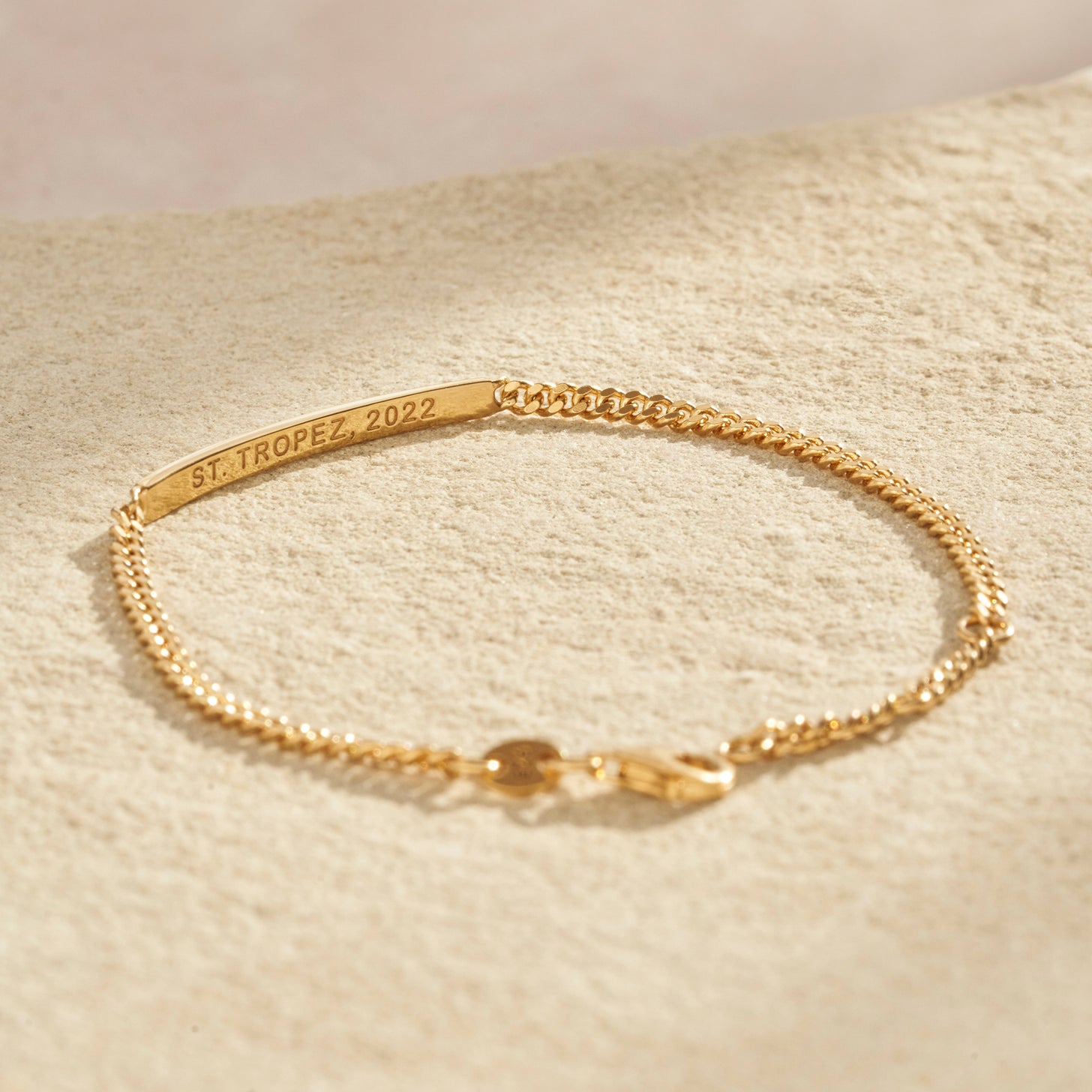 Our dainty Dana Bracelet can be customized with engraving on the inner and outer band of the bar