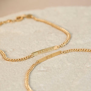 Front and back engravings on the Darcy Engraved Bar Bracelet