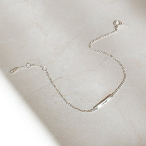 A silver Dayne Engraved Bar Bracelet by Grace Personalized