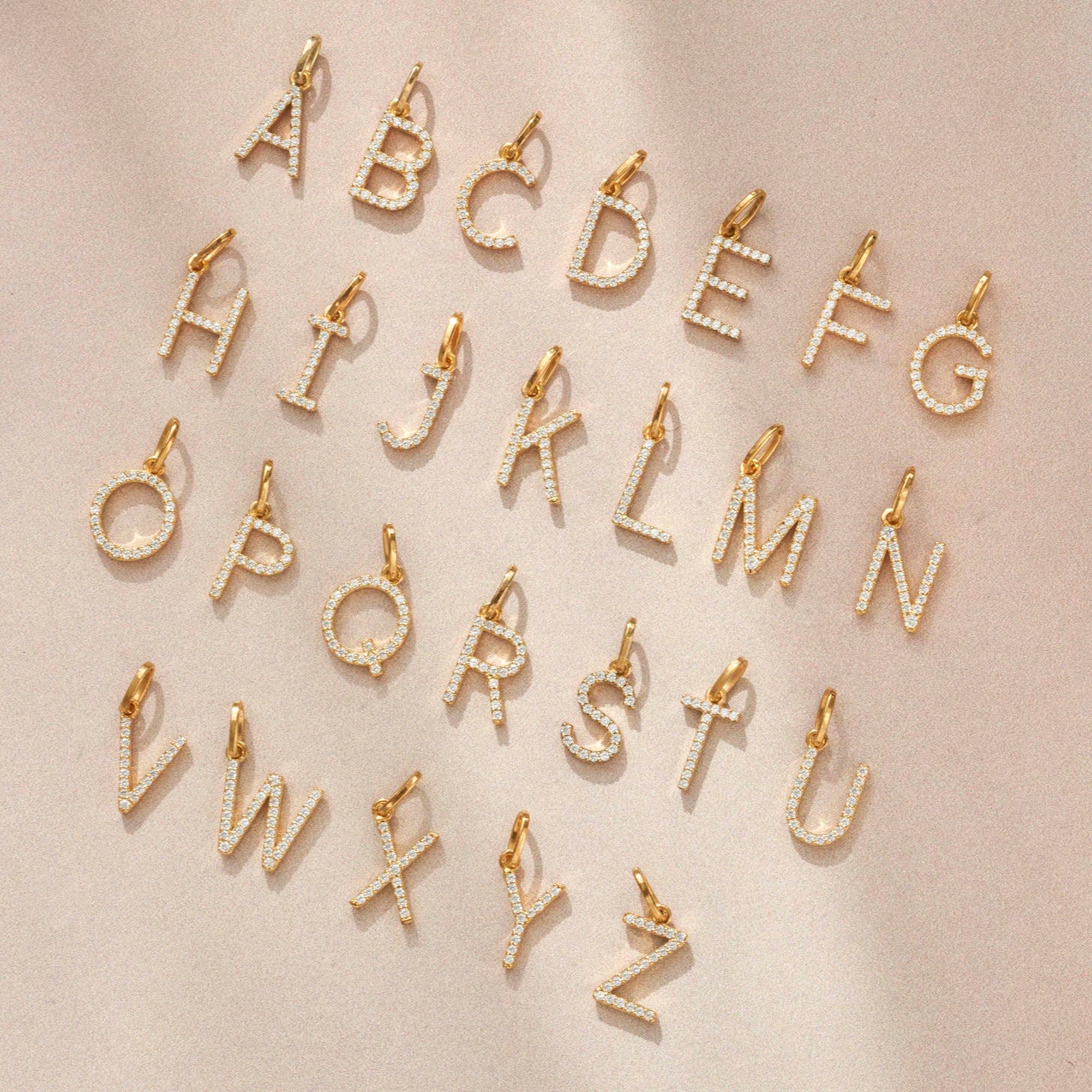 26 letters of Ivy Necklace with cubic zirconia stones in a modern font