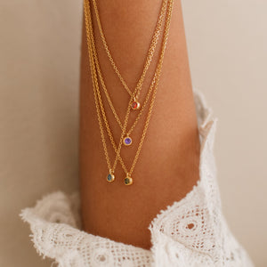 Garnet, amethyst, blue topaz, and peridot birthstones on our Josie Birthstone Necklace