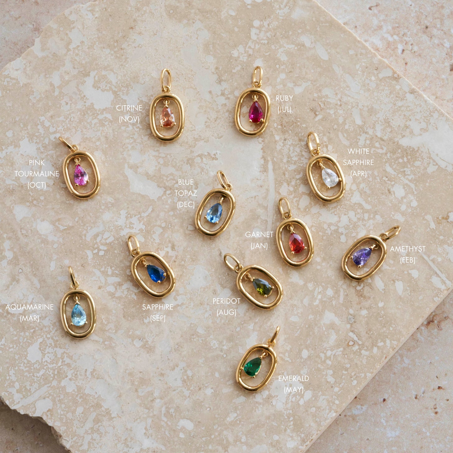 Teardrop birthstone pendants in a gold oval frame on our beautiful Journey Birthstone Necklace
