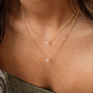 Custom pave letter necklace with cubic zirconia stones on a dainty cable chain