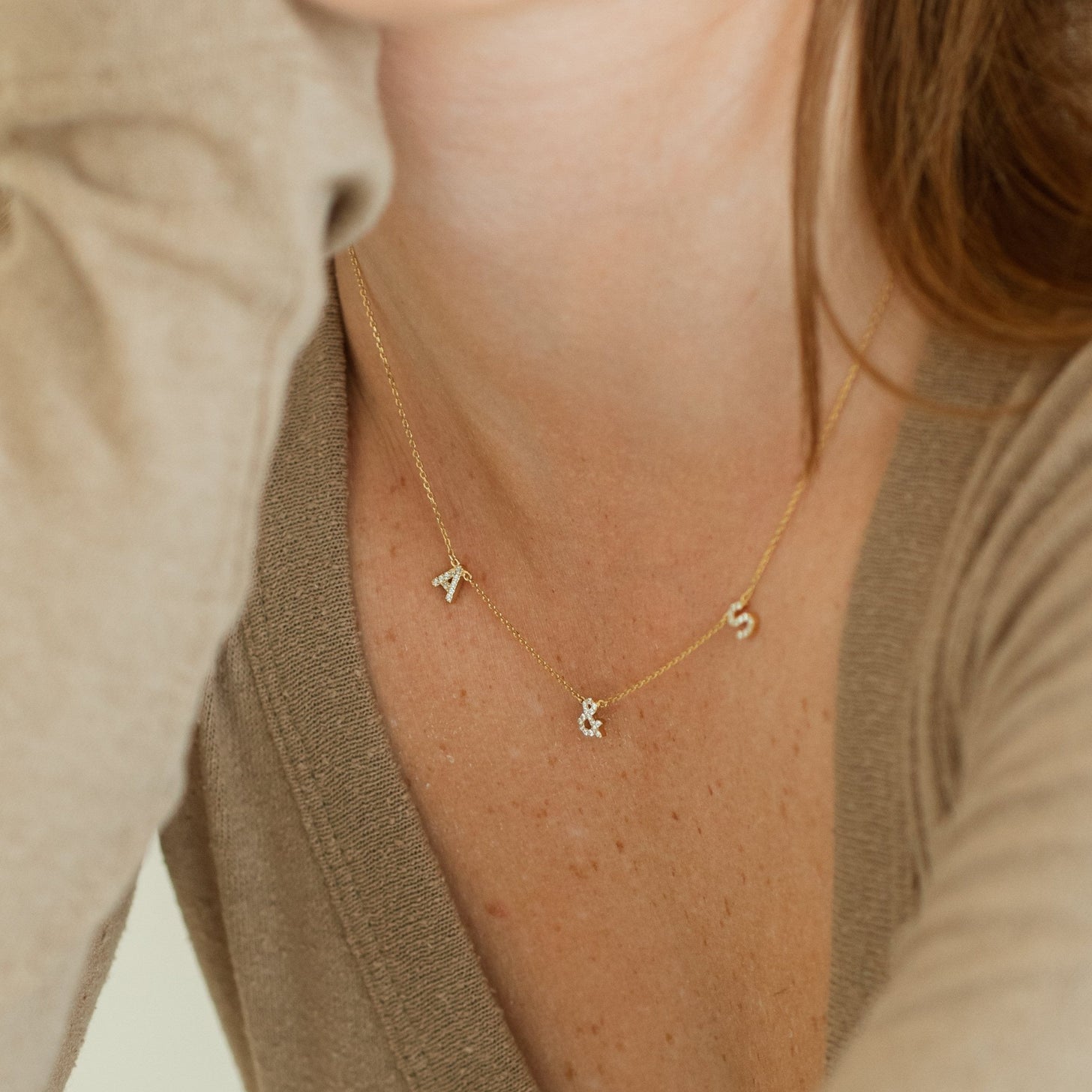 Custom pave initials necklace on a dainty chain