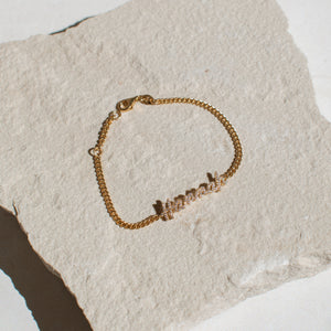 Pave script name bracelet with curb chain