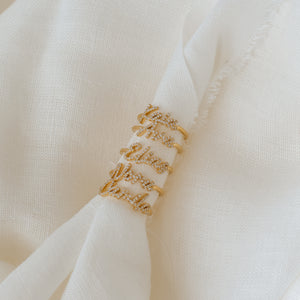 Examples of Naia Name Rings with pave letters