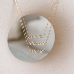 Custom diamond name necklace with CZ pave stones on a dainty chain in gold