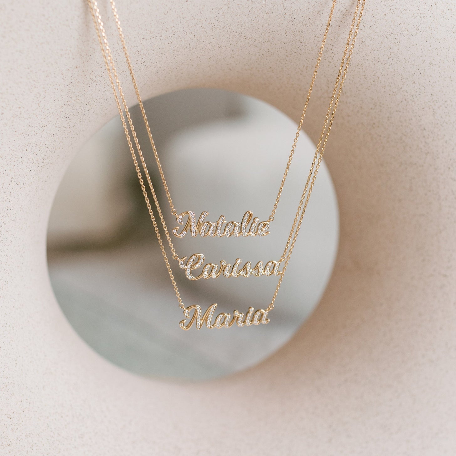 Custom diamond name necklace with CZ pave stones on a dainty chain in gold