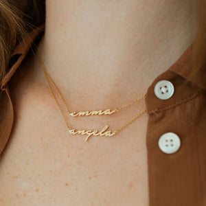 Custom name necklaces in an elegant script cursive font. Available in gold, silver, and rose gold