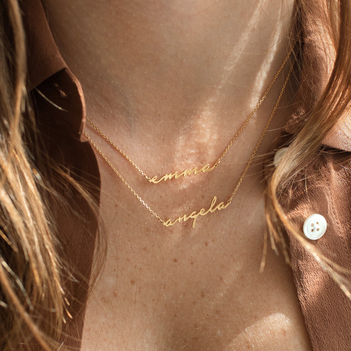 Custom gold script name necklace with romantic cursive font