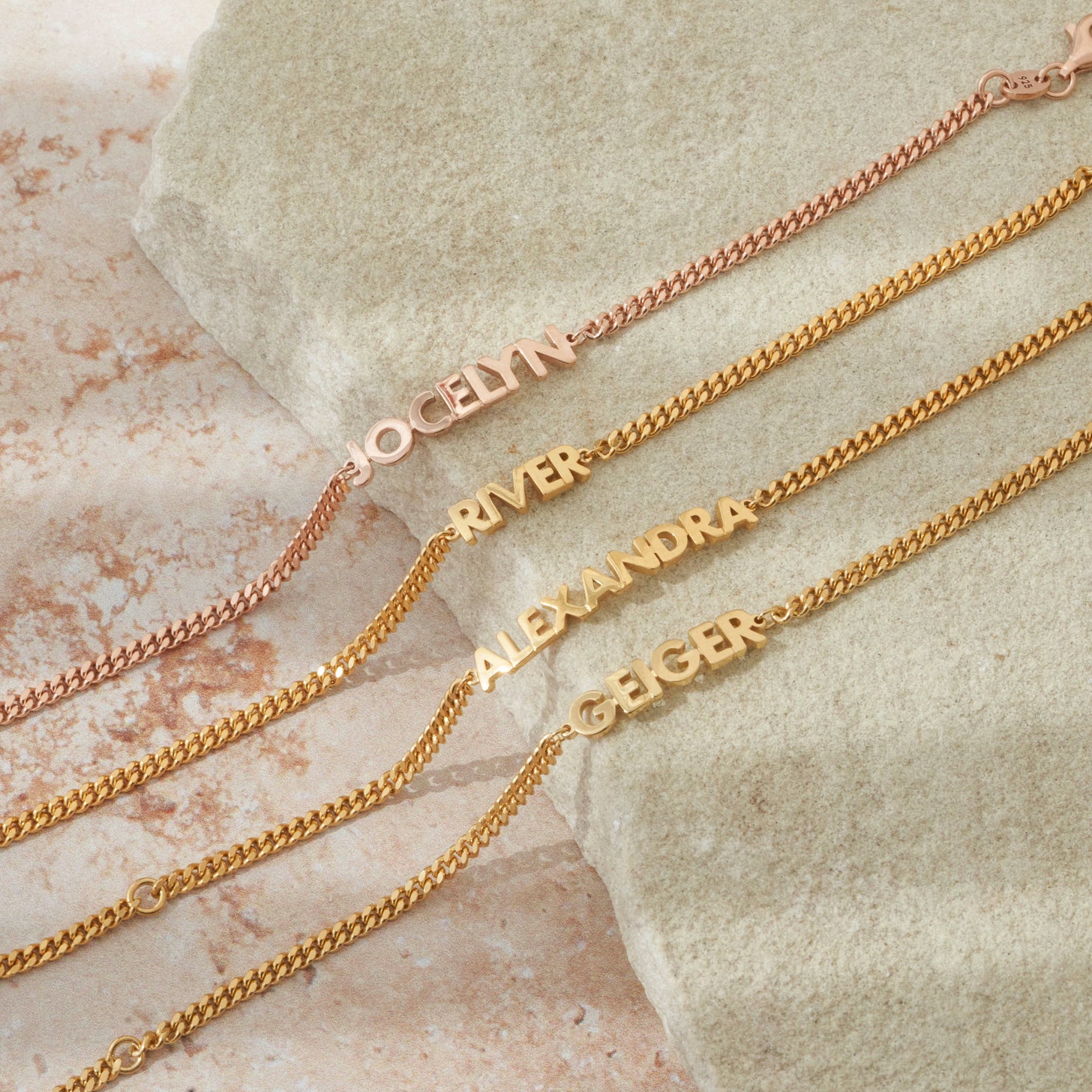 Gold and rose gold bracelets with custom names and curb chains