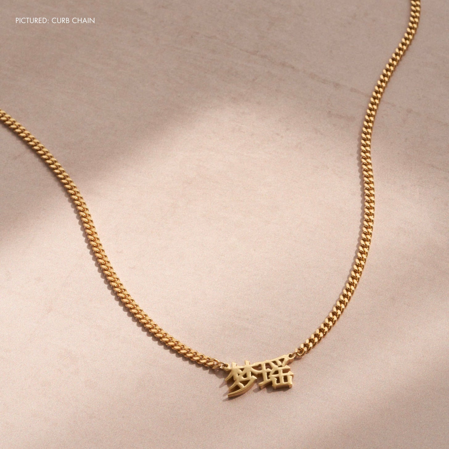 Custom Chinese Name Necklace in gold with a bold curb chain