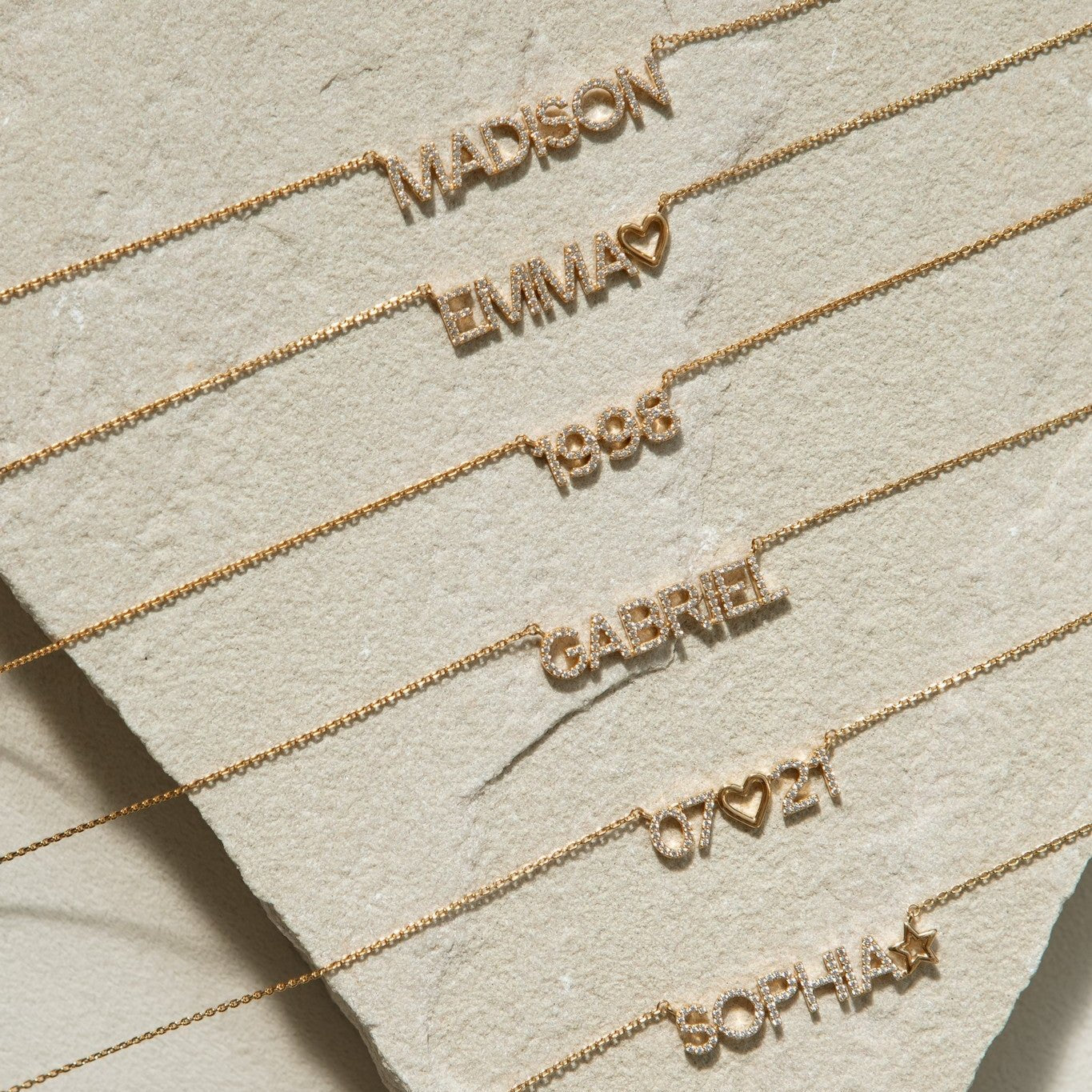 Examples of custom Nina Pave Name Necklaces