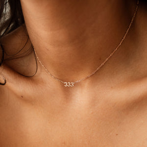 Model wearing rose gold Noah Name Necklace