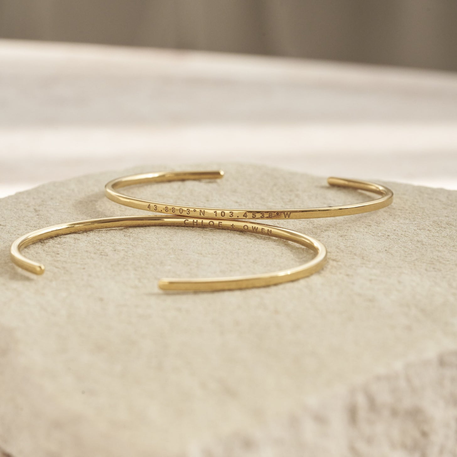 Front and back engravings on the custom Rebecca Coordinate Cuff Bracelets