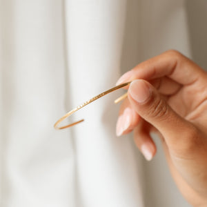Front engraving of gold cuff bracelet