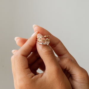 Gold and silver name rings in dainty cursive font